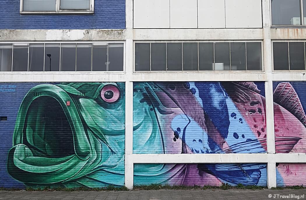 Street art van Dopie tijdens mijn street art wandeling in het M4H gebied en Delfshaven in Rotterdam